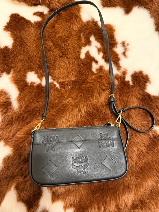 MCM Handbags - MCM Black Embossed Leather Crossbody Bag with Gold Hardware